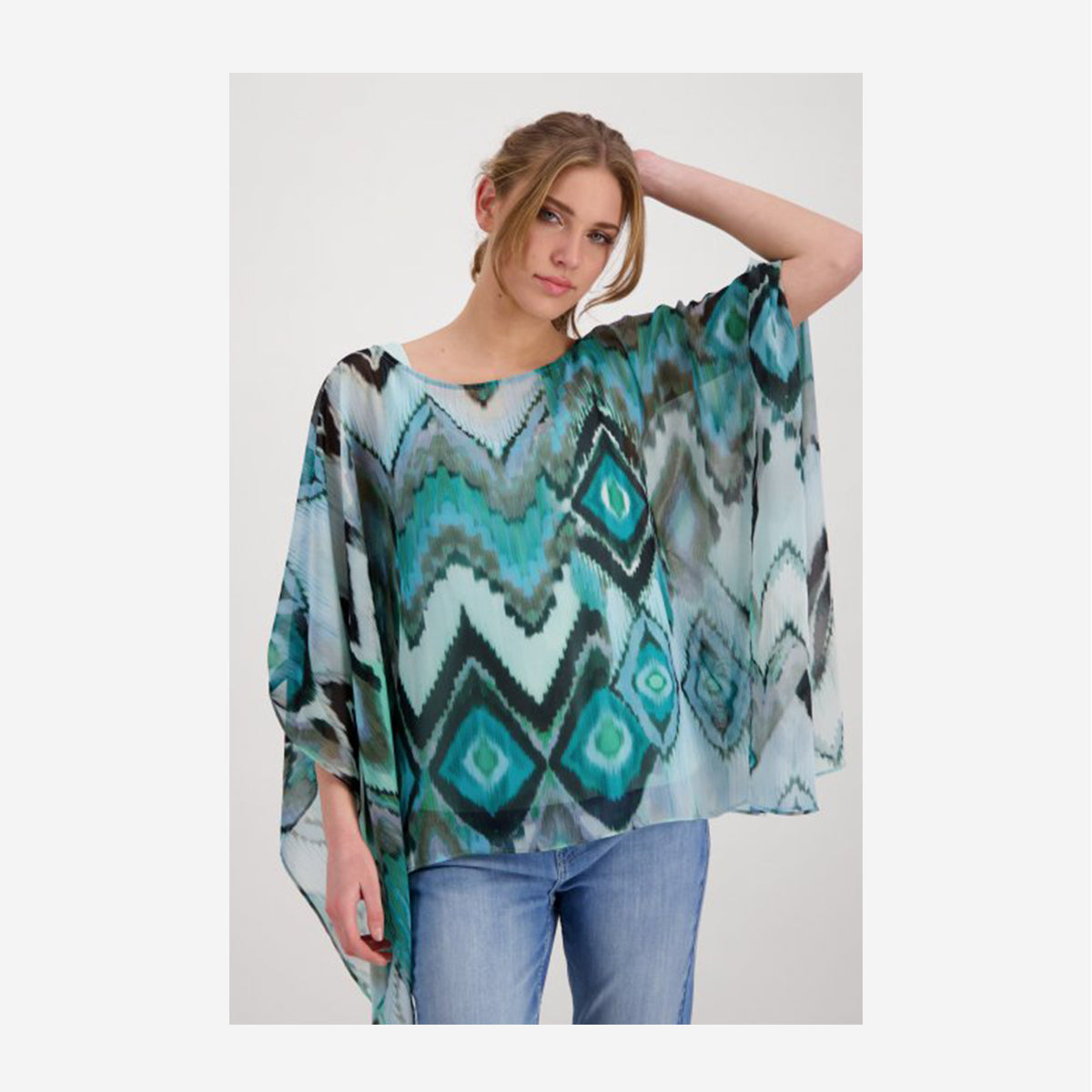SEMI-TRANSPARENT TUNIC BLOUSE WITH IKAT PATTERN