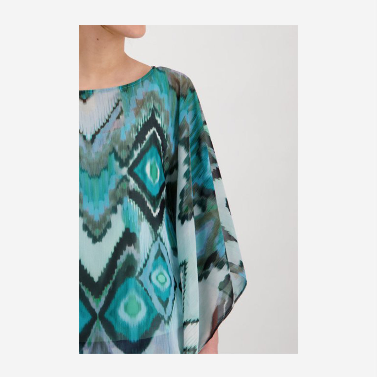 SEMI-TRANSPARENT TUNIC BLOUSE WITH IKAT PATTERN