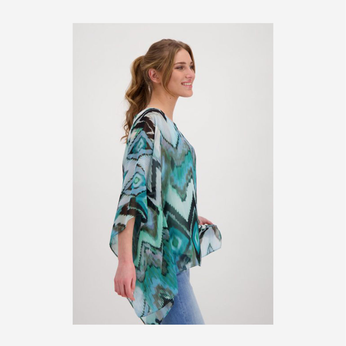 SEMI-TRANSPARENT TUNIC BLOUSE WITH IKAT PATTERN