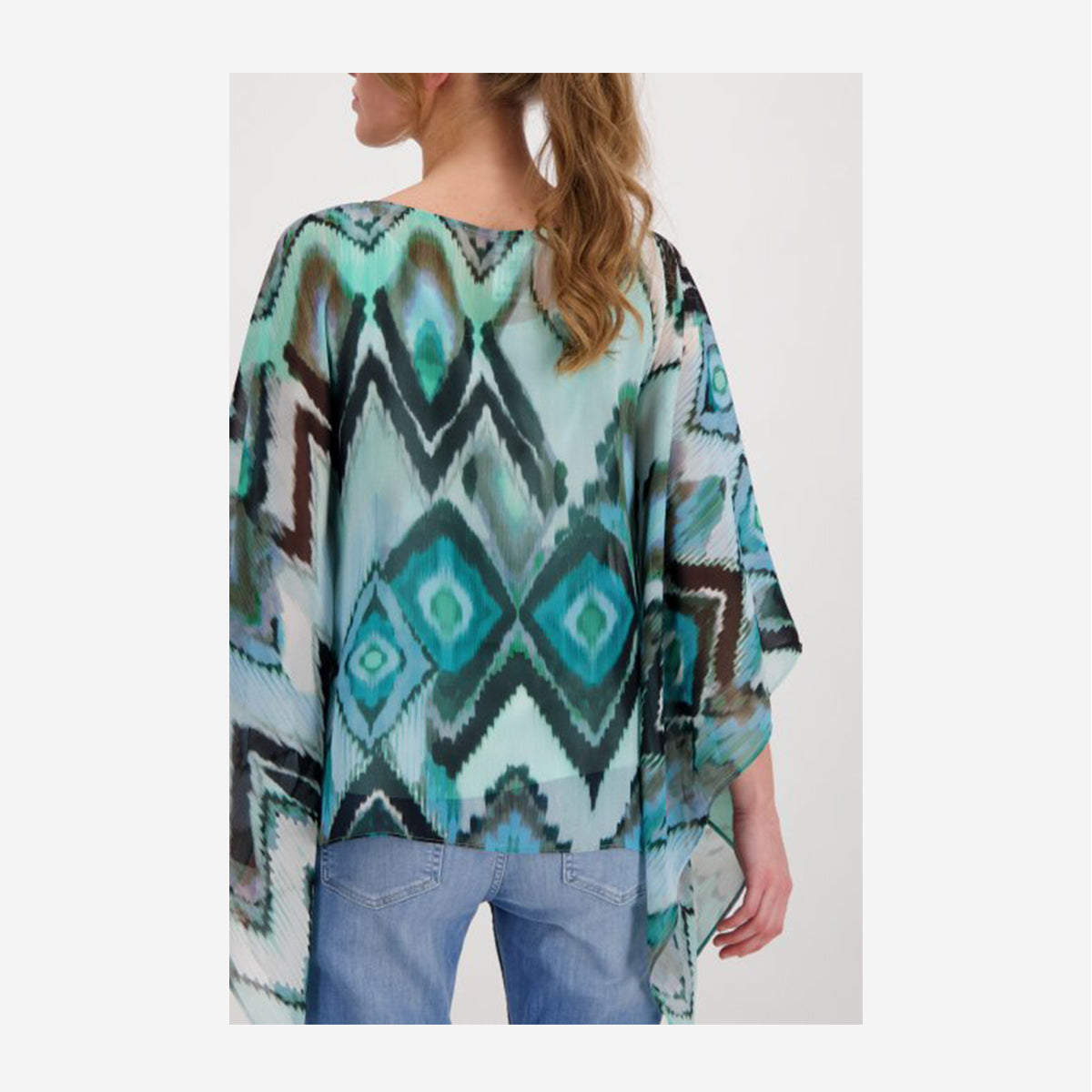 SEMI-TRANSPARENT TUNIC BLOUSE WITH IKAT PATTERN