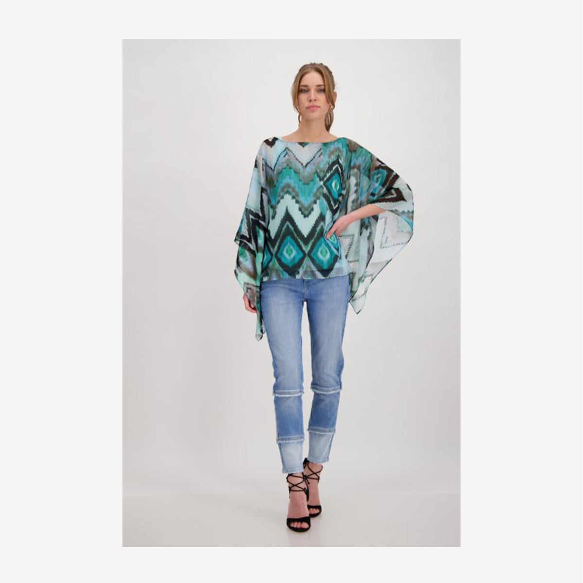 SEMI-TRANSPARENT TUNIC BLOUSE WITH IKAT PATTERN