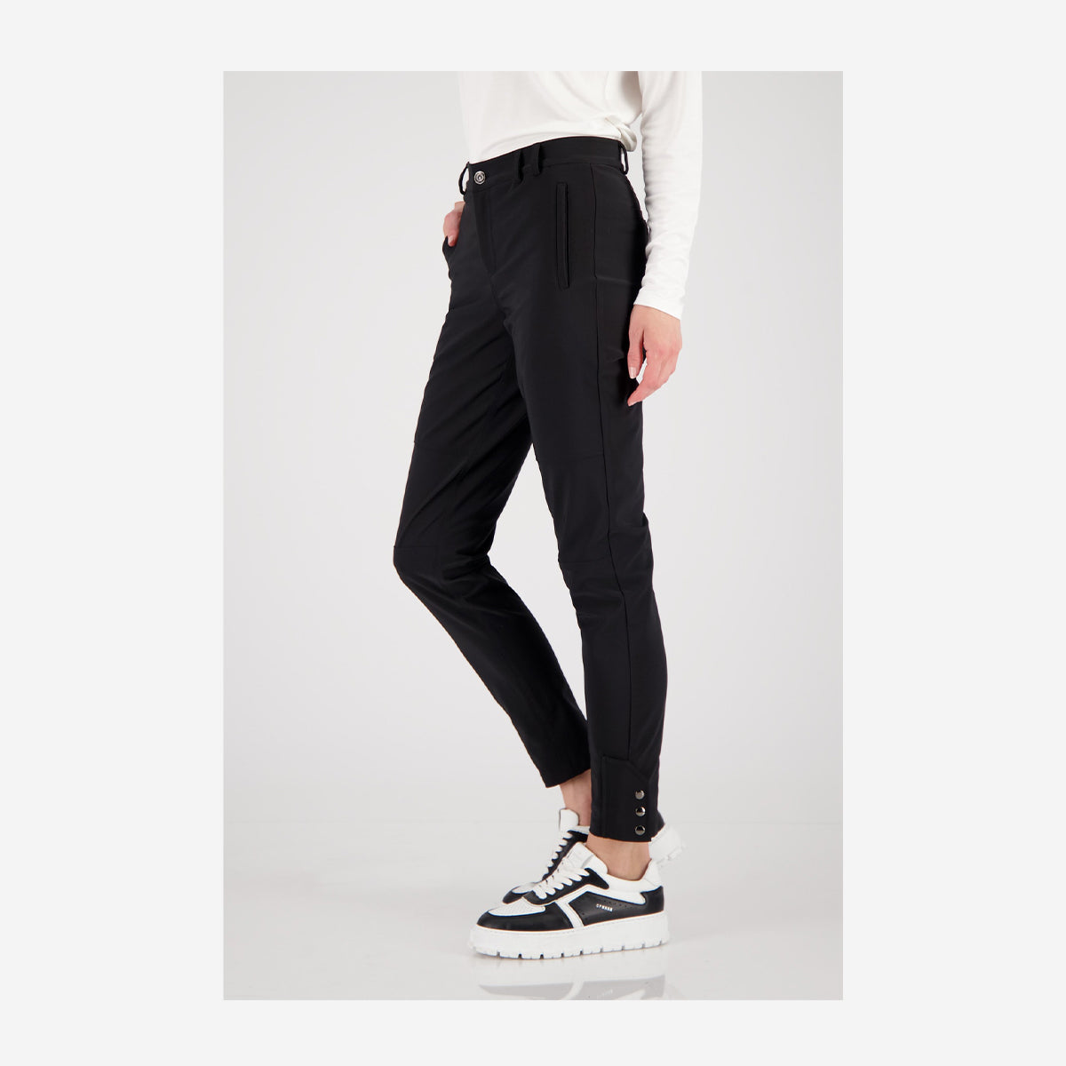 ELONGATED TECHNO PANTS WITH BUTTONS
