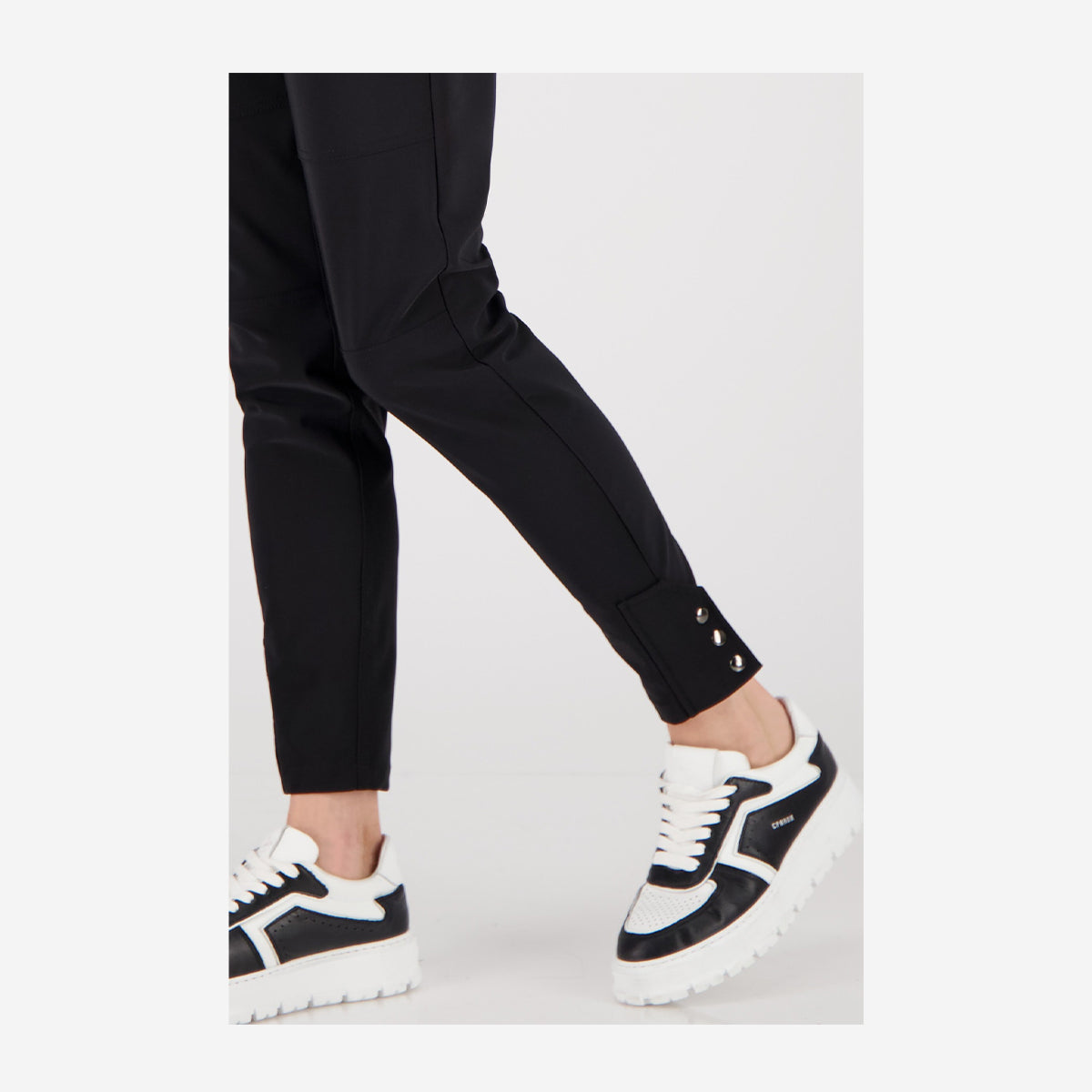 ELONGATED TECHNO PANTS WITH BUTTONS