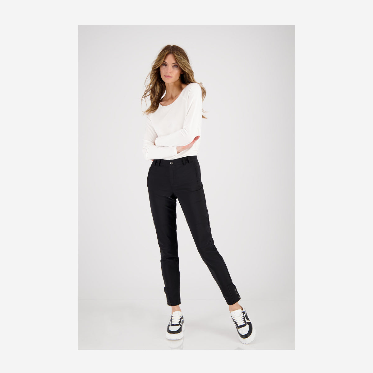 ELONGATED TECHNO PANTS WITH BUTTONS